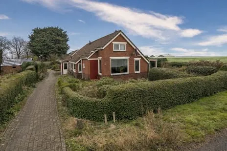 Woning te koop: 1e Grenslaan 1, Verspreide huizen ten noordoosten van Rhederbrug Bellingwolde