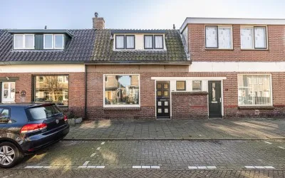 Tussenwoning te koop: Ambachtstraat 52, Oranjebuurt Hillegom