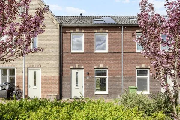 Tussenwoning te koop: Baas en Domburgstraat 31, Bodegraven
