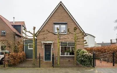 Vrijstaande woning te koop: Badweg 7, Geldermalsen Centrum Geldermalsen