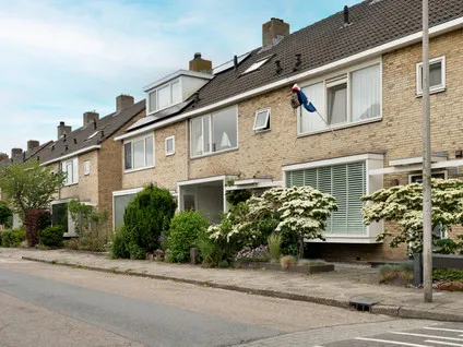 Tussenwoning te koop: Bateweg 46, Woubrugge-West Woubrugge