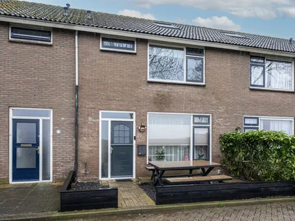 Tussenwoning te koop: Berkenlaan 15, Ooltgensplaat woonkern Ooltgensplaat