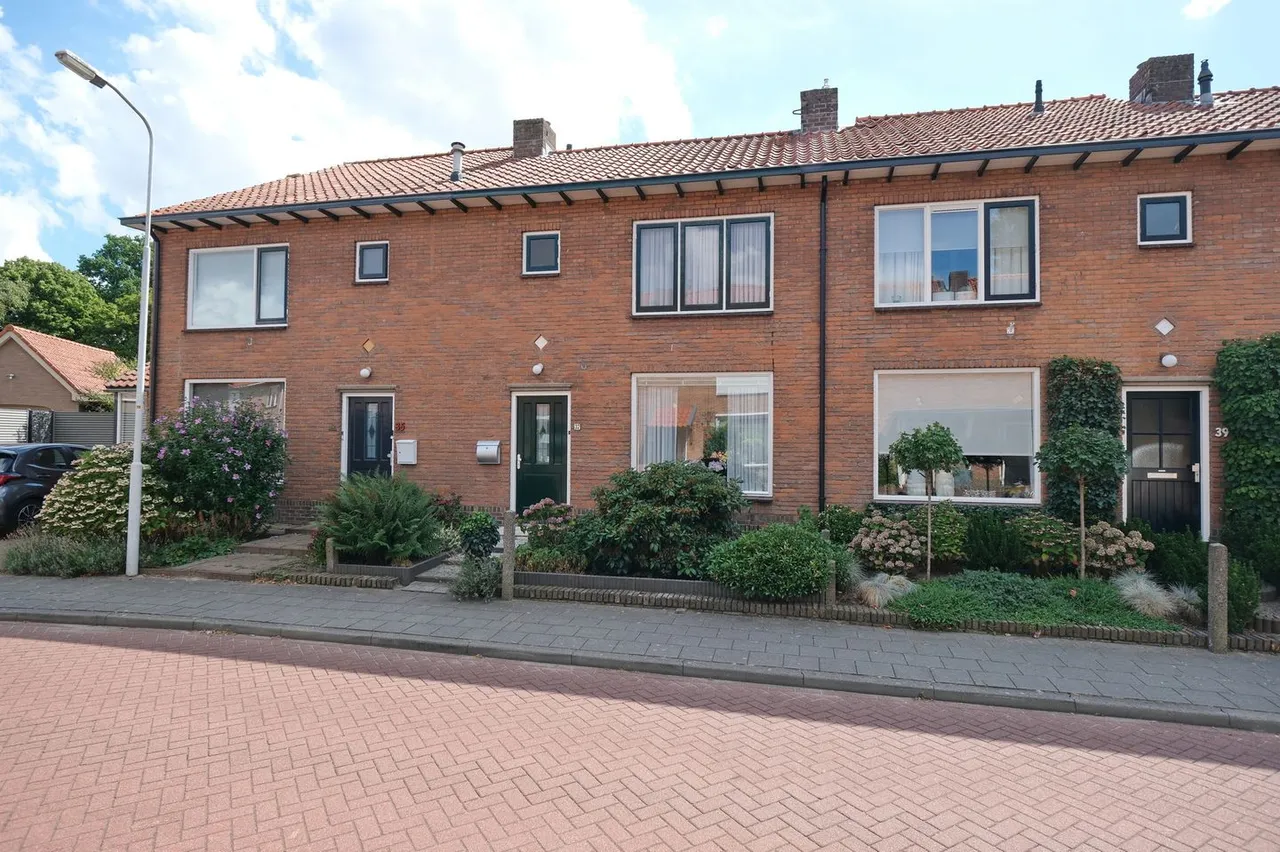 Tussenwoning te koop: Bremlaan 37, Ede