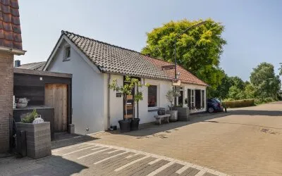 Twee-onder-één-kap te koop: Buitendijk 102, Hank Hank