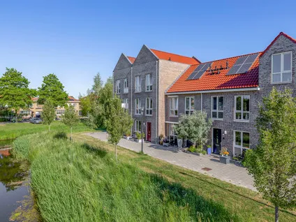 Tussenwoning te koop: Buitenring 16, Middelharnis westplaat Middelharnis