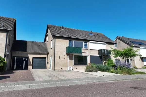 Tussenwoning te koop: Burg. Dittersstraat 29, Kern Beneden-Leeuwen Beneden-Leeuwen