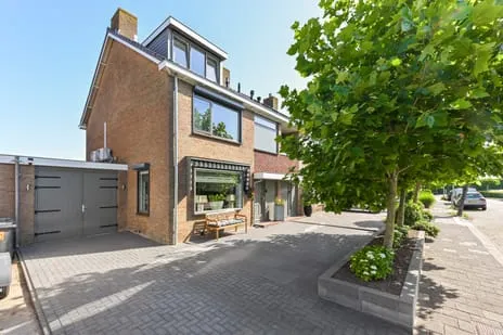 Tussenwoning te koop: Burgemeester Vijlbriefstraat 21, Westzaan Noord Westzaan