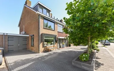 Tussenwoning te koop: Burgemeester Vijlbriefstraat 21, Westzaan Noord Westzaan