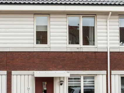 Tussenwoning te koop: Burgemeester van Meetelenstraat 34, Dorpscentrumcentrum Uithoorn