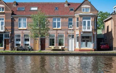 Tussenwoning te koop: Comriekade 14, Woubrugge Woubrugge