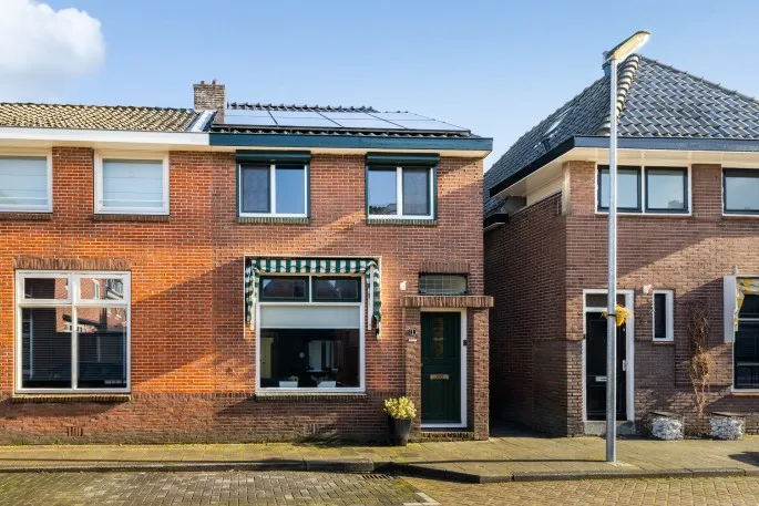 Tussenwoning te koop: Dahliastraat 1, Woerden