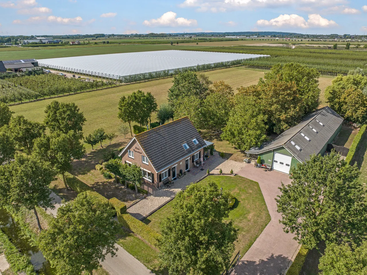 Vrijstaande woning te koop: De Dreef 12, Dodewaard