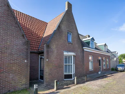 Tussenwoning te koop: De Kamp 6, Woudsend Woudsend