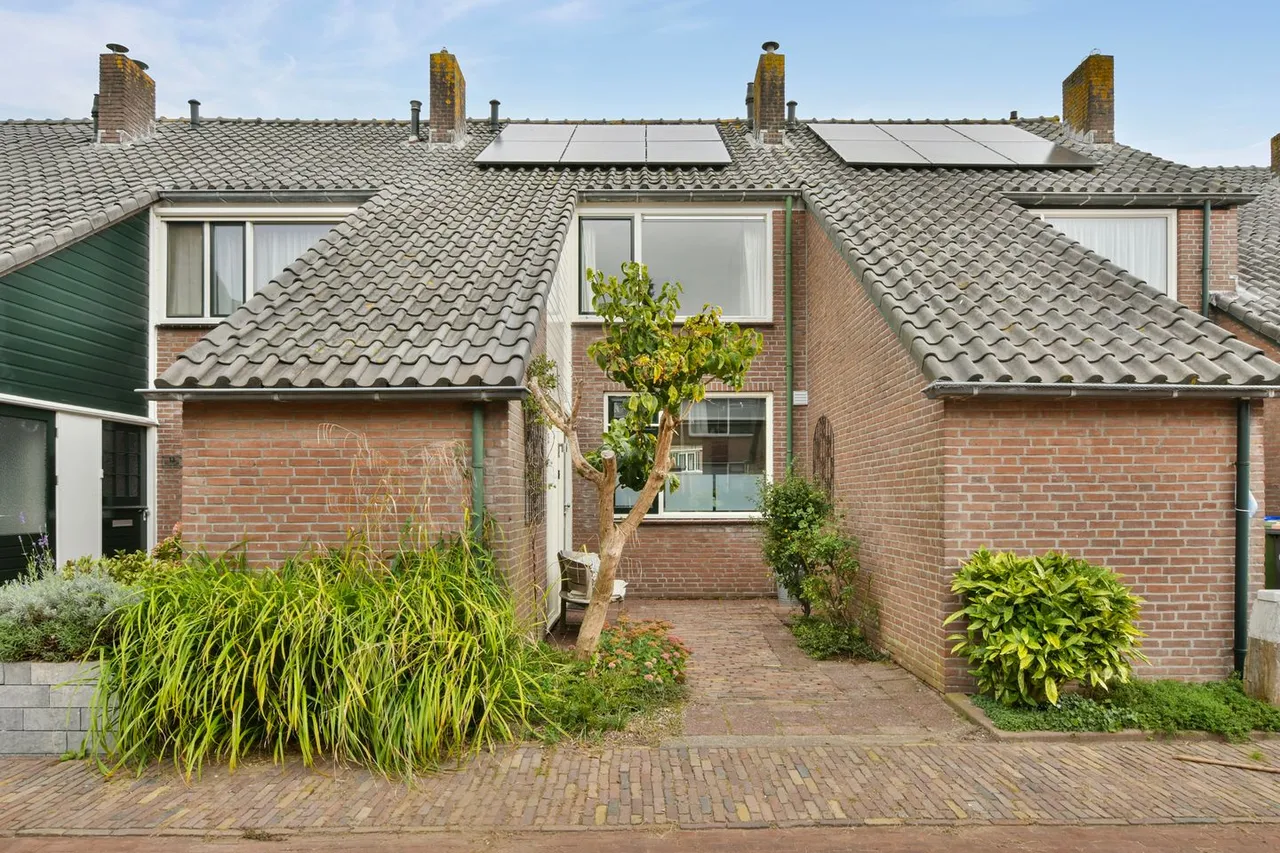 Tussenwoning te koop: de Lange Gangh 15, Muiden