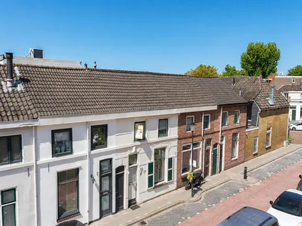 Tussenwoning te koop: Den Bommelsestraat 6, Eilandenbuurt Schiedam