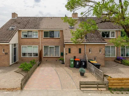 Tussenwoning te koop: Dokter Hoogkamerlaan 30, Middenmeer Centrum Middenmeer