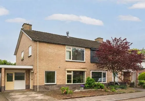 Tussenwoning te koop: Domela Nieuwenhuisstraat 5, Didam-Noord Didam