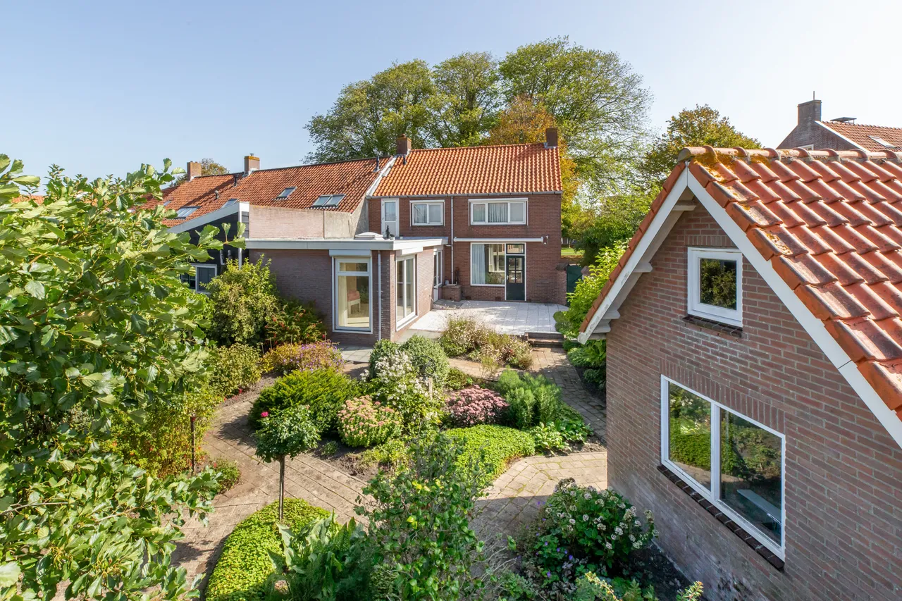 Hoekwoning te koop: Dorpsplein 14, Koudekerke