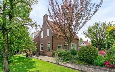 Woning te koop: Dorpsstraat 20, Opheusden