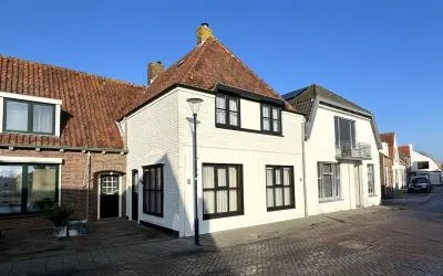 Tussenwoning te koop: Dorpsstraat 21A, Zuidzande Zuidzande