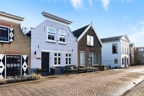 Tussenwoning te koop: Dorpsstraat 56, Gouderak Gouderak