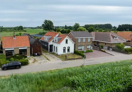 Vrijstaande woning te koop: Dorpsweg 9, t Lange Land Hellevoetsluis