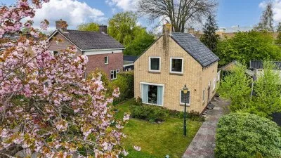 Vrijstaande woning te koop: Dr G van Schouwenlaan 15, Noord Heerenveen