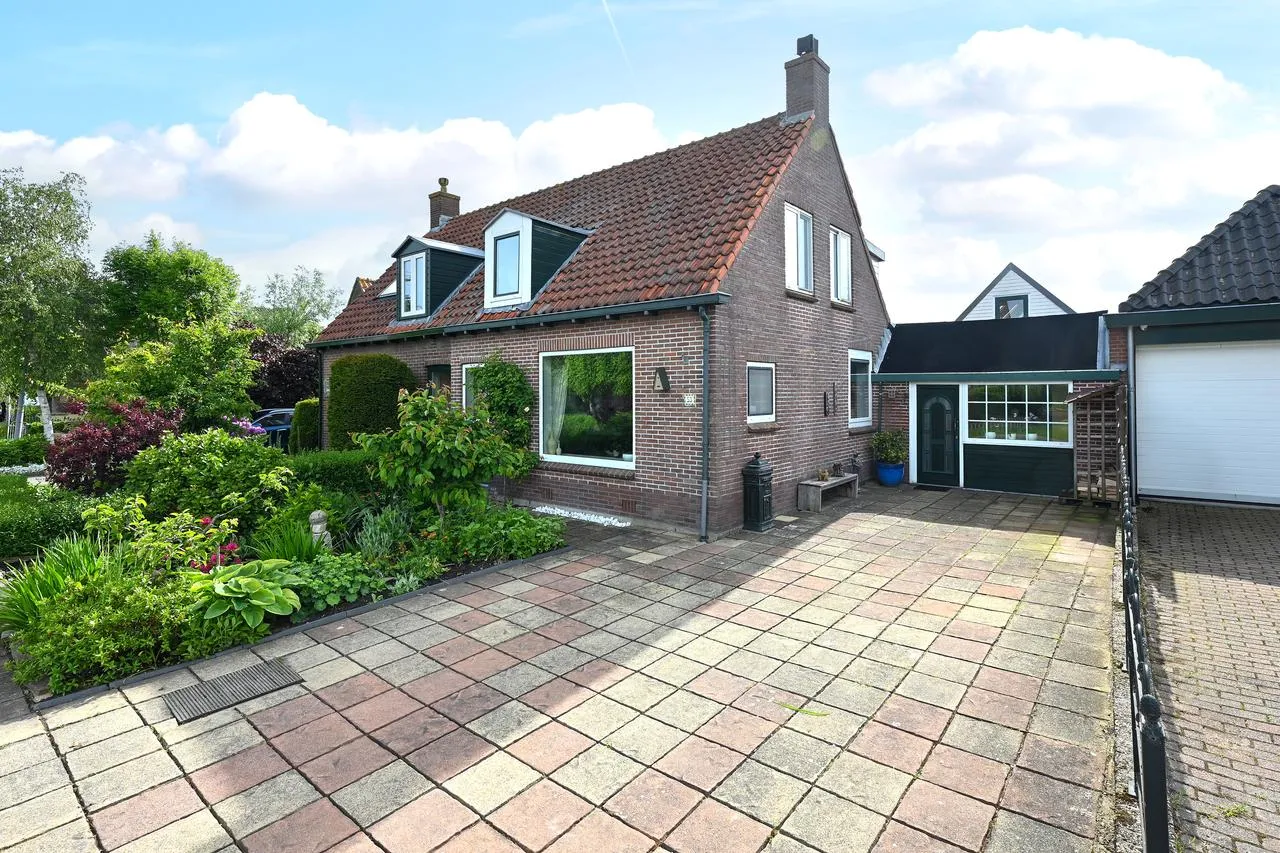 Tussenwoning te koop: Drechtdijk 53, De Kwakel