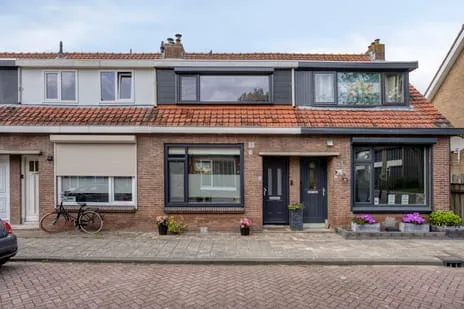 Tussenwoning te koop: Dwarsstraat 27, Puttershoek Woonkern Puttershoek