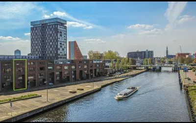 Tussenwoning te koop: Eemskanaal 43, Kop van Oost Groningen