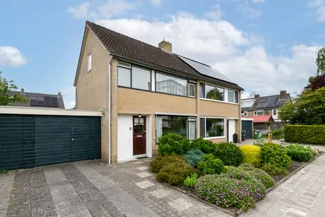 Tussenwoning te koop: Fabriciuslaan 4, De Singels west Drachten