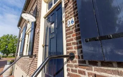 Twee-onder-één-kap te koop: Grotestraat 36, Well L
