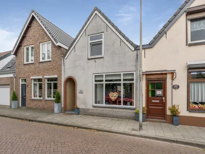 Tussenwoning te koop: Hendrikstraat 31, Heerma van Vossstraat-Molenbeek Roosendaal