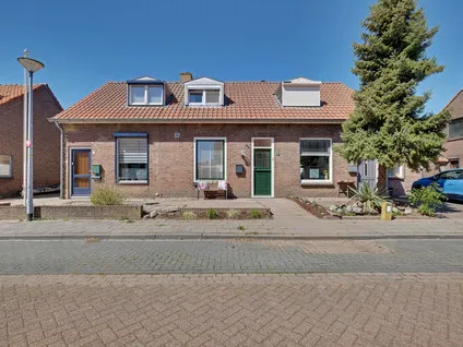Tussenwoning te koop: Hofstraat 8, Spijk Spijk