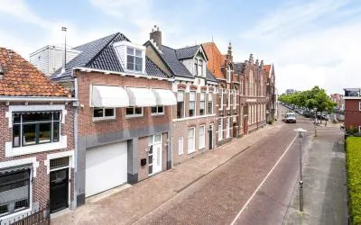 Tussenwoning te koop: Hooiblokstraat 7, Sneek binnen de grachten Sneek