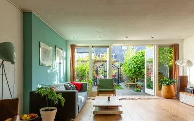 Tussenwoning te koop: Ina Dammanstraat 6, Westerwatering Zuid Zaandam
