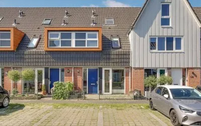Tussenwoning te koop: Inlaagdijk 127, Bangert en Oosterpolder - Buurt 35 02 Zwaag