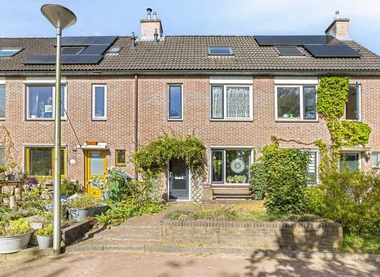 Tussenwoning te koop: ir. Munterlaan 70, Heveadorp Heveadorp