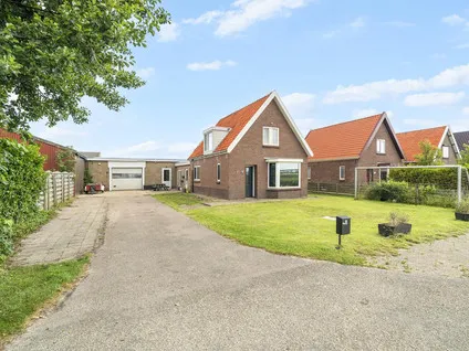 Detached house for sale: J. C. de Leeuwweg 48, Buitengebied Breezand Breezand