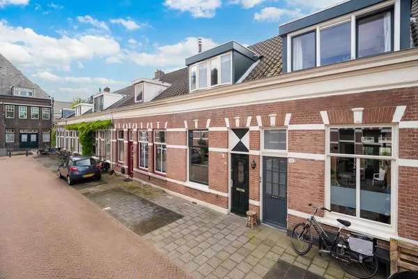 Tussenwoning te koop: Jan Schoutenstraat 12, Burgemeester de Raadtsingel en omgeving Dordrecht