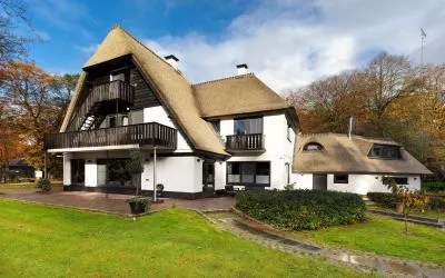 Vrijstaande woning te koop: Jan van Riemsdijklaan 1, Verspreide huizen Heerde-Zuid Heerde