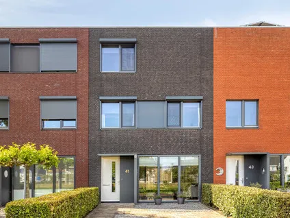 Tussenwoning te koop: John Denverlaan 41, Overzuid Goes