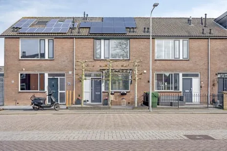 Tussenwoning te koop: John F. Kennedystraat 63, Heinenoord Woonkern Heinenoord