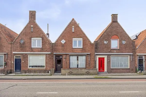 Tussenwoning te koop: Julianaweg 25, Volendam-Katham + Planetenbuurt Volendam