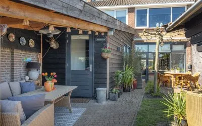 Tussenwoning te koop: K R Poststraat 32, Centrum Heerenveen