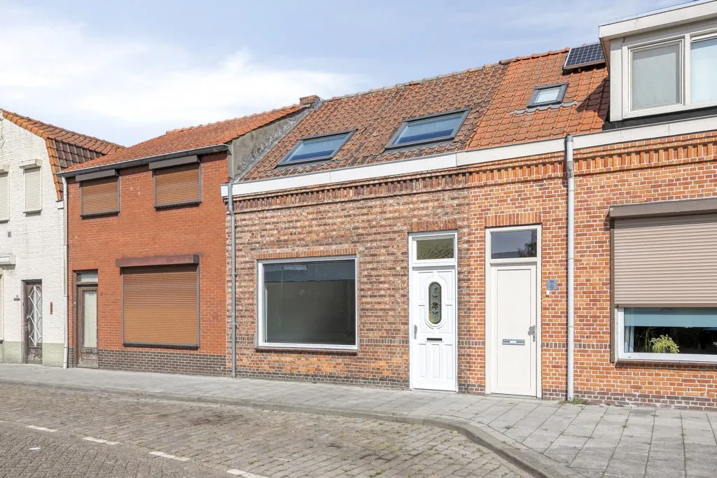 Tussenwoning te koop: Kloosterlaan 57, Sas Van Gent