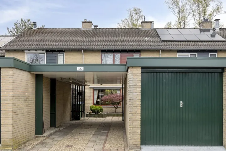 Tussenwoning te koop: Kokkelmanlanden 107, Stroinkslanden Noord-West Enschede