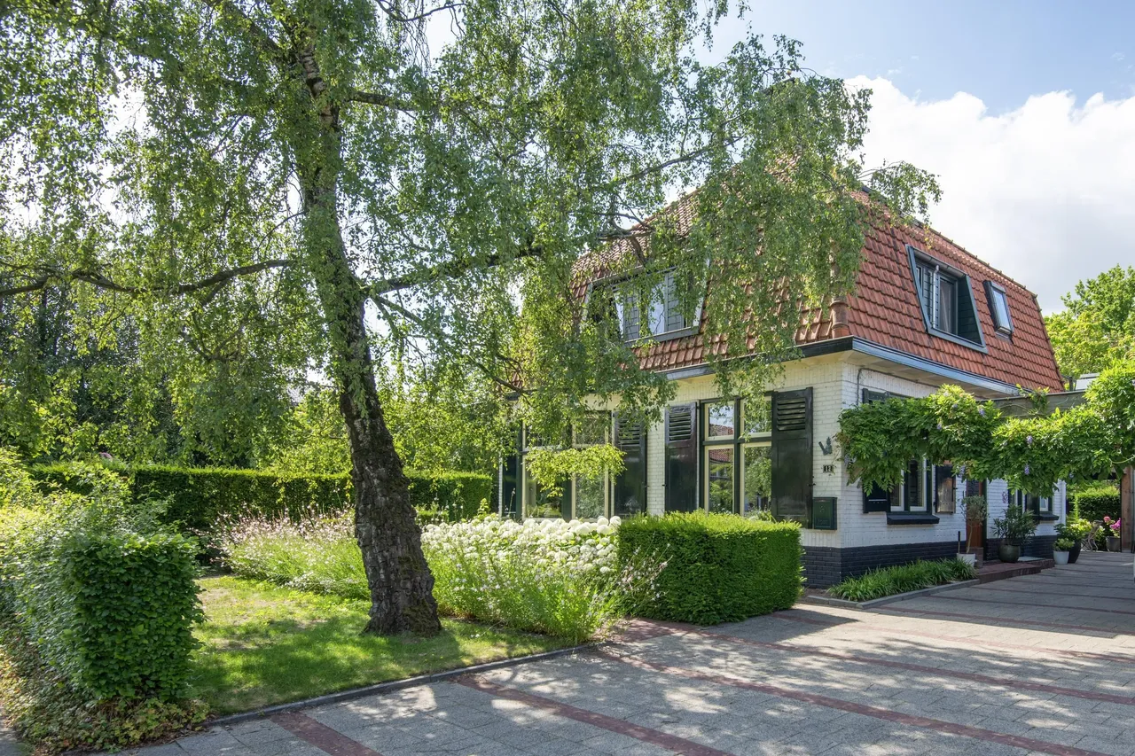 Vrijstaande woning te koop: Koninginnelaan 12, Voorthuizen