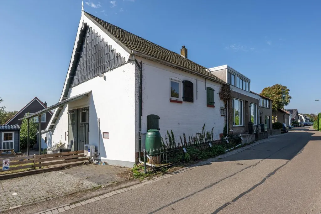 Vrijstaande woning te koop: Langstraat 42, Achthuizen