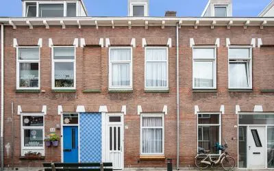 Tussenwoning te koop: Maasdamsestraat 10, Eilandenbuurt Schiedam
